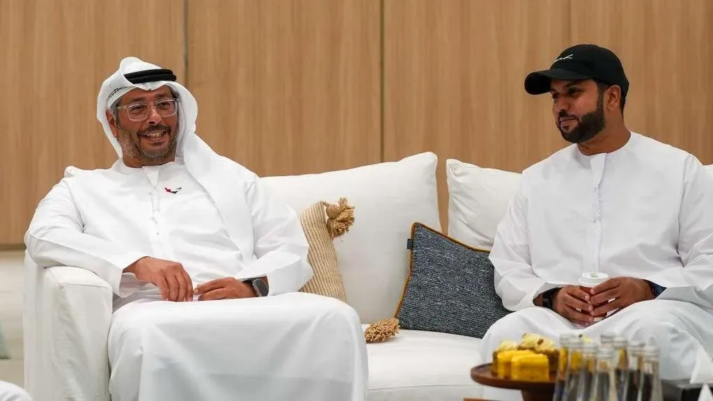 Two guests in conversation at a federation event