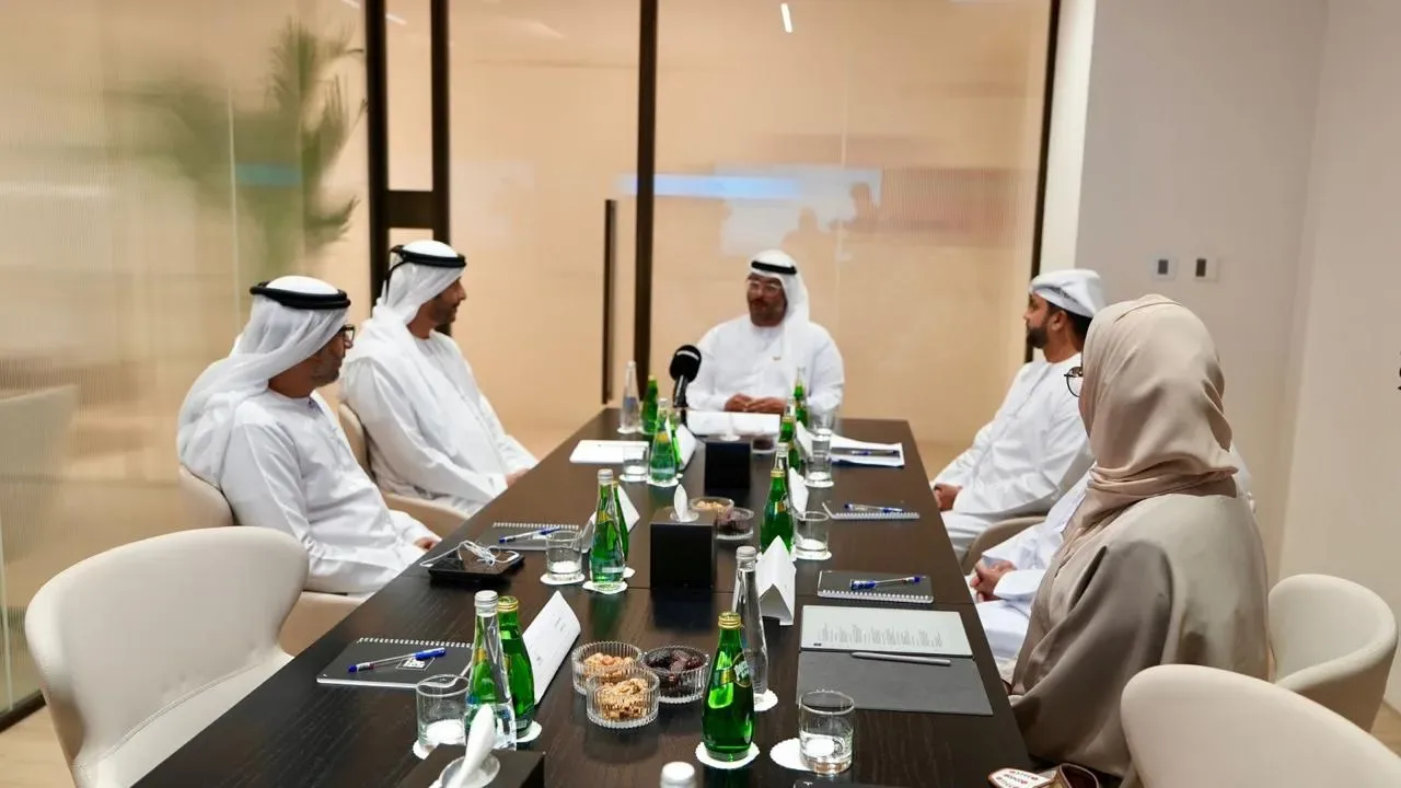 Members seated around the table at a federation meeting