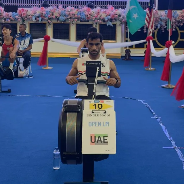 A UAE rower at station 10 in the single 2000 metres at an indoor rowing championship